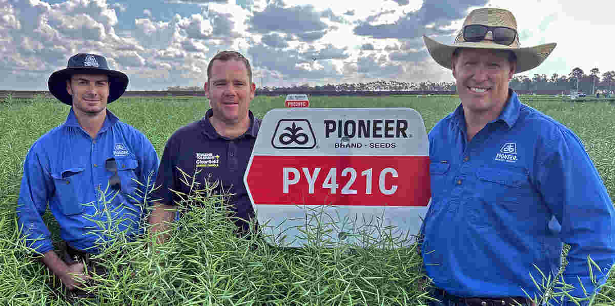 (L-R) Technical Support Manager Ken Haxen, Regional Sales Manager Adam Pitman and Territory Sales Manager Chris Rutland proudly promote some of the latest Pioneer brand Seeds’ canola hybrids.